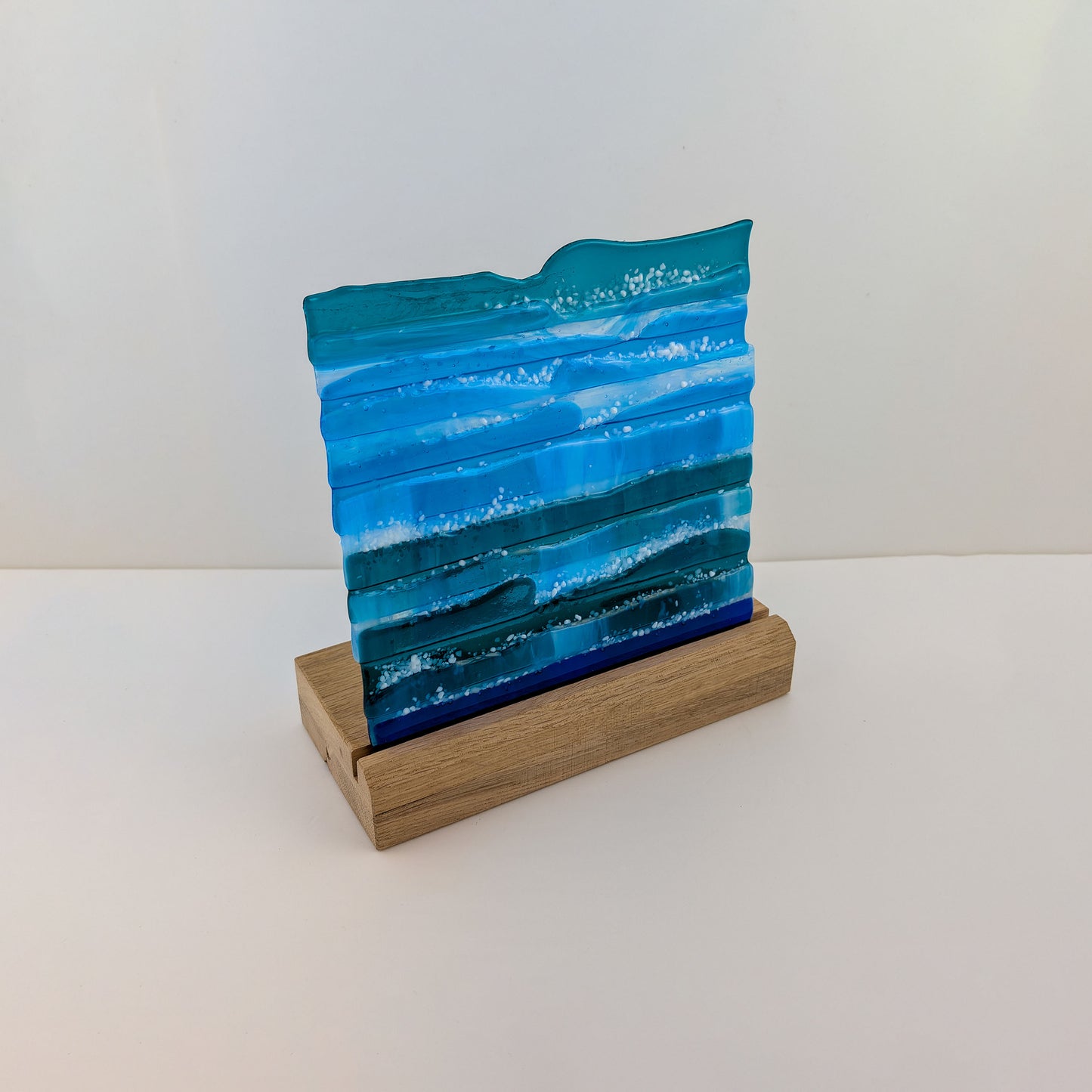 Seacape in wooden stand